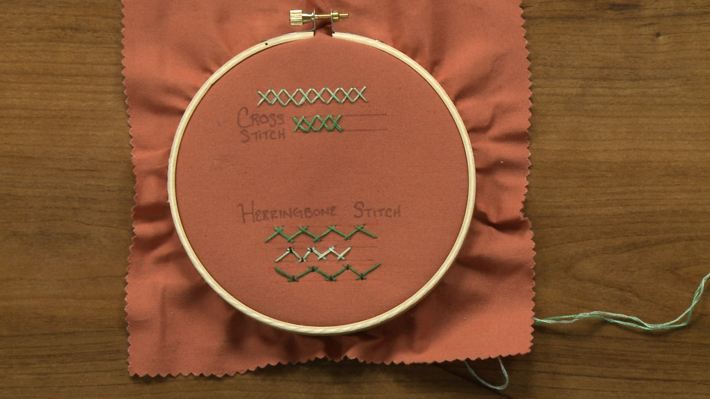 Cross stitch and herringbone stitch