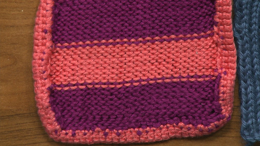 Purple and coral knitting