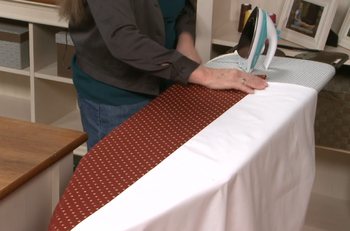 Ironing on an ironing board