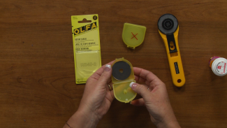 Rotary cutter and needle safety