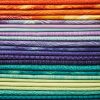 Colorful pile of folded fabric