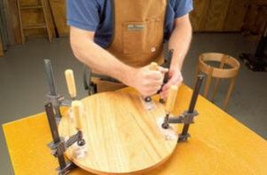 Photo 6: I clamp the fibers by using flat scrap blocks wrapped in plastic so they don’t adhere to the table. I let this glue-up set overnight to make sure the glue dries completely.