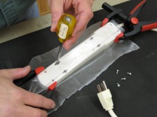 An Easy Solution To Mounting a Power Strip WoodWorkers Guild of America