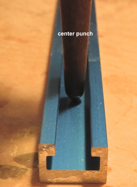 Use-a-center-punch-to-mark-holes