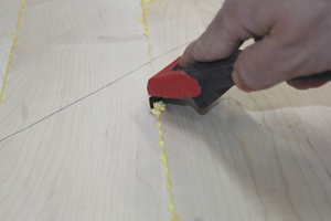 scraping-glue-on-panel