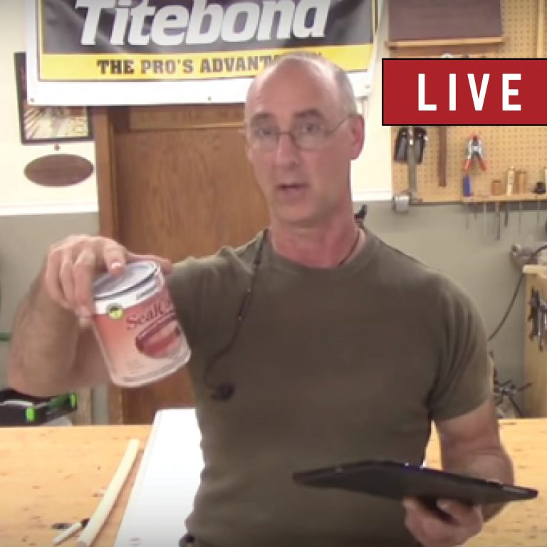 Man holding a can of sealant