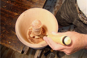 carving the core of the urn