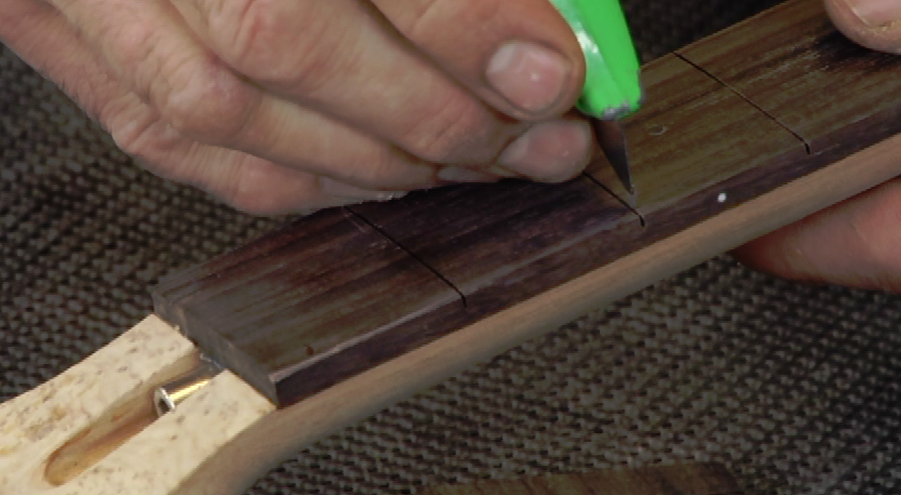 Marking on wooden guitar neck