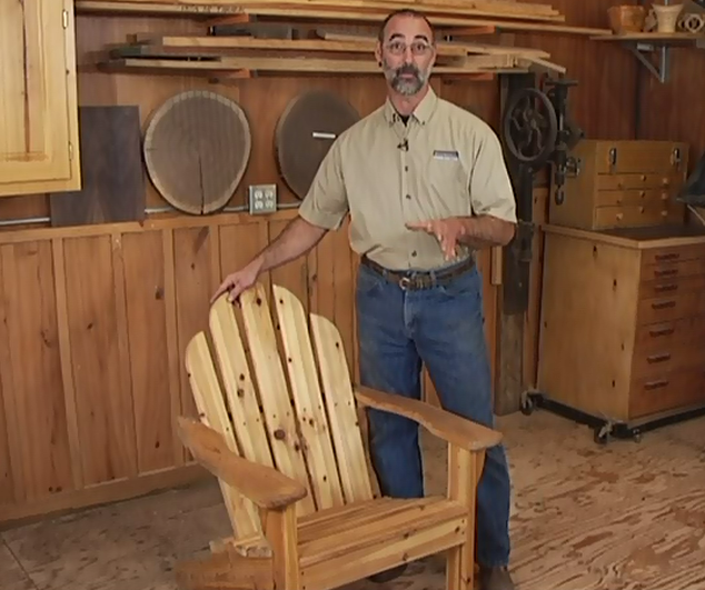 Man with an Adirondack chair