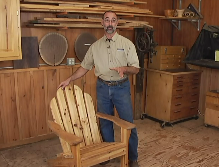 Man with an Adirondack chair