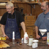 Two men wood working
