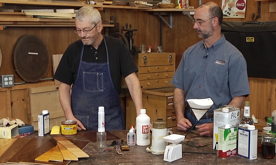 Two men wood working