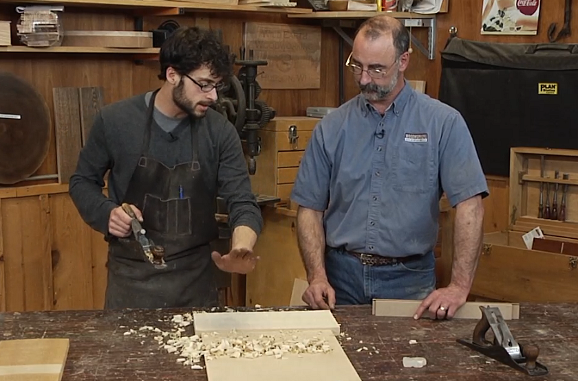 Two men wood working
