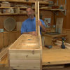 Man building a wooden planter