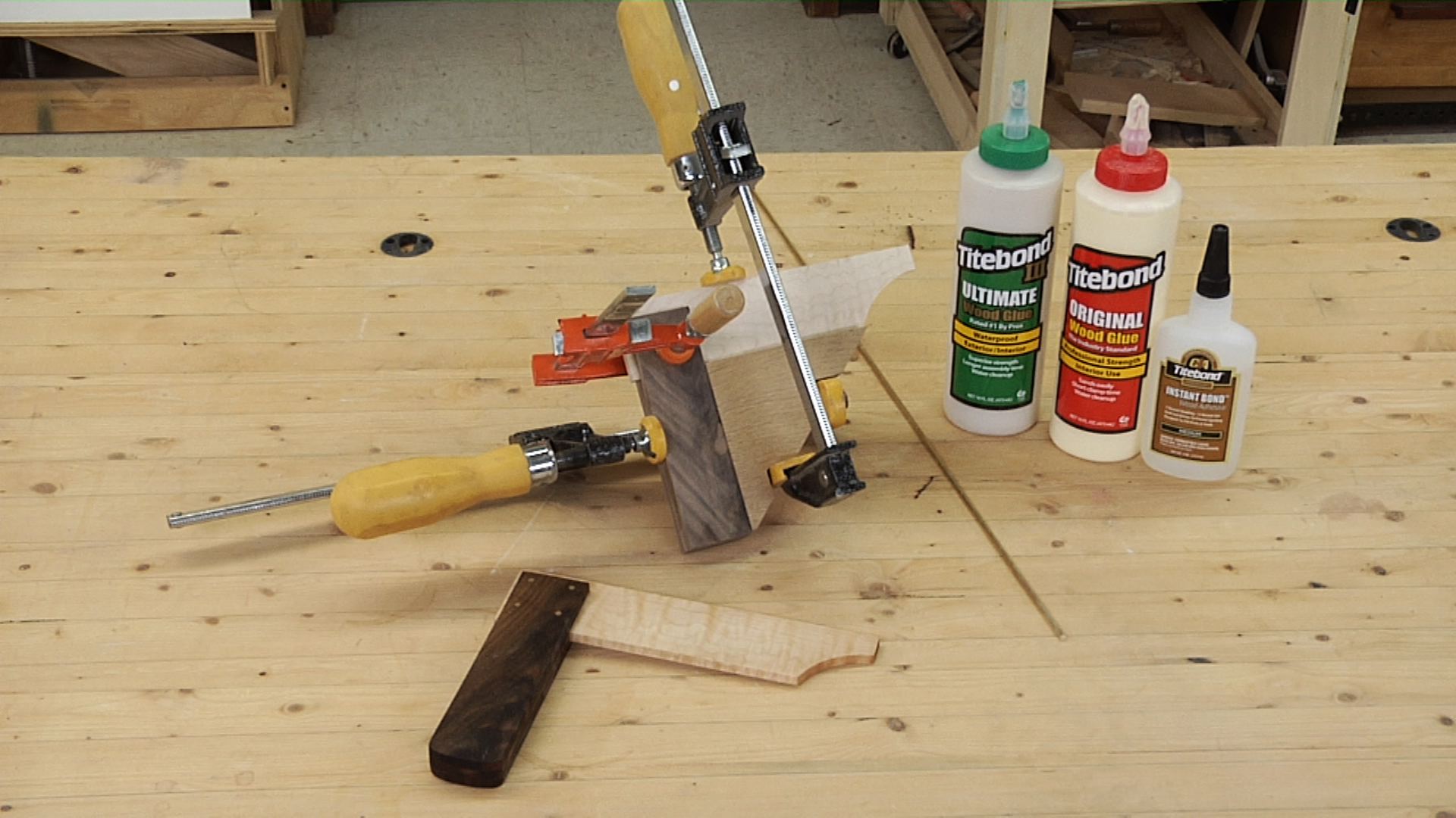 Clamped wood pieces and adhesive bottles