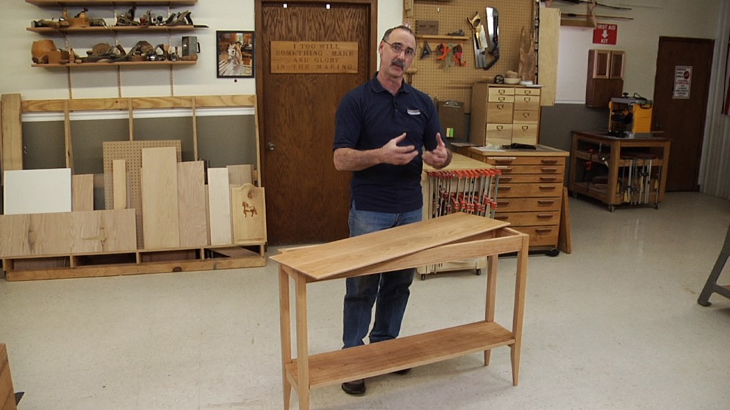 Man making a piece of wooden furniture