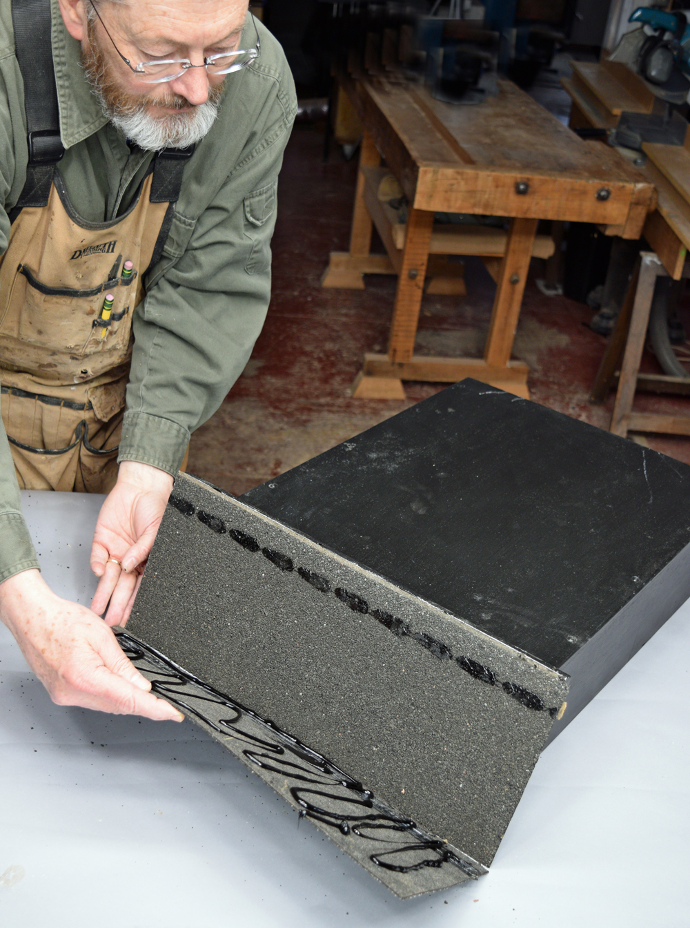 adding shingles to the roof
