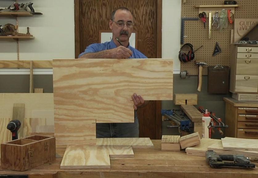 Man with a large piece of wood