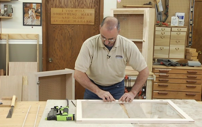 Man creating a wood frame