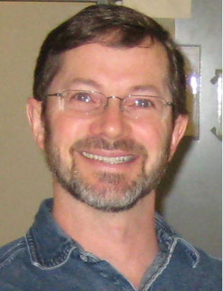 Man in glasses smiling
