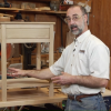 Man with a small end table