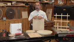 Man with different shaped wood pieces