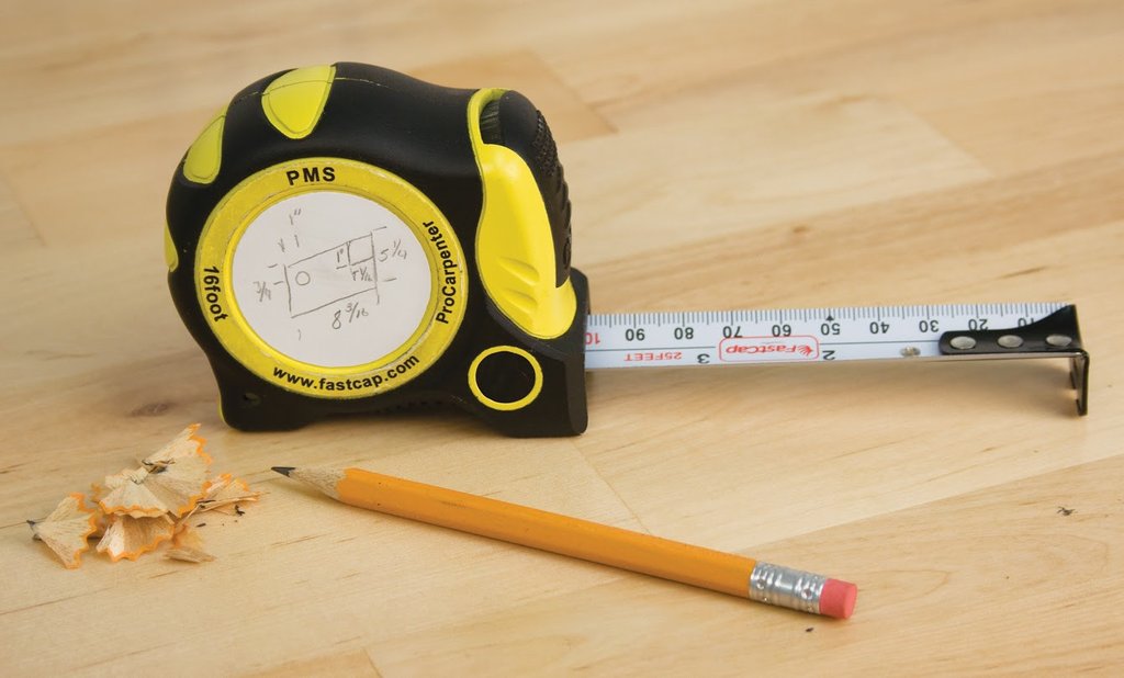 Solved A carpenter is using a tape measure to get the length