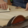 Sanding a piece of round wood