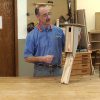Man making a wooden bird house