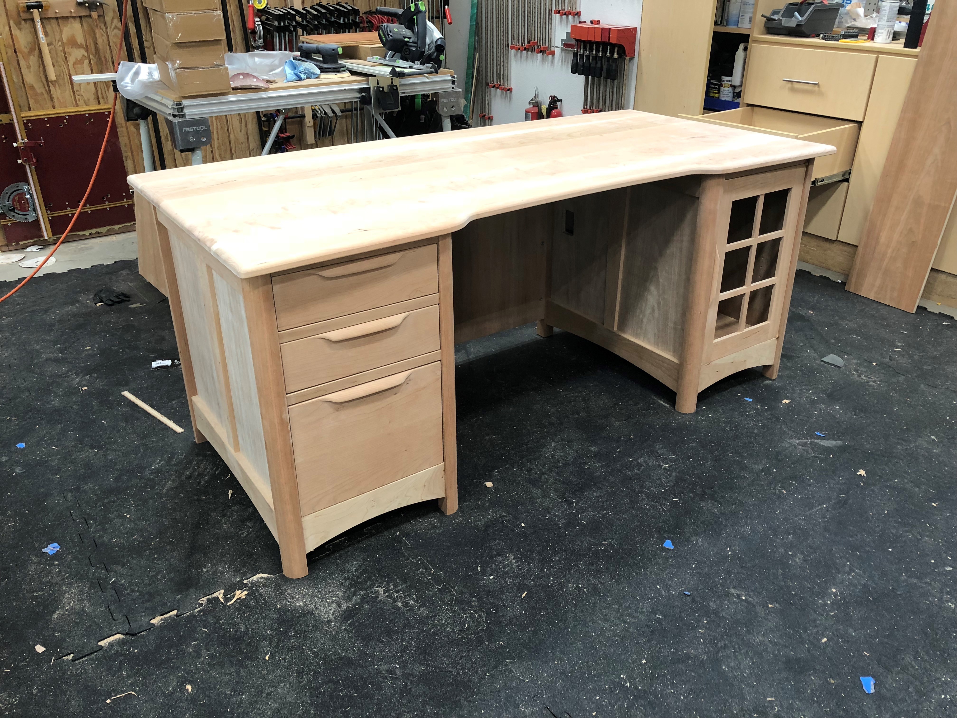 unfinished wooden desk