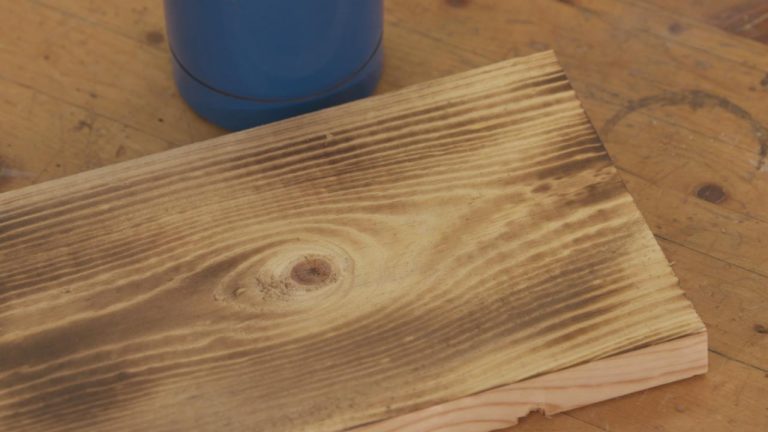 Wood board with a knot