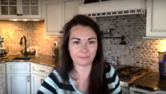 Selfie of a woman in a kitchen