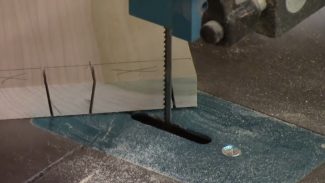 Person using a bandsaw