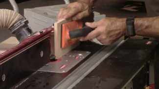 Man using a router table