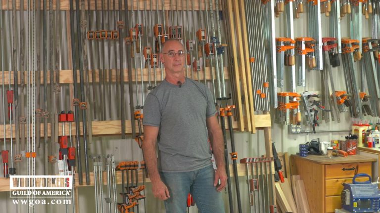 Man in front of clamps