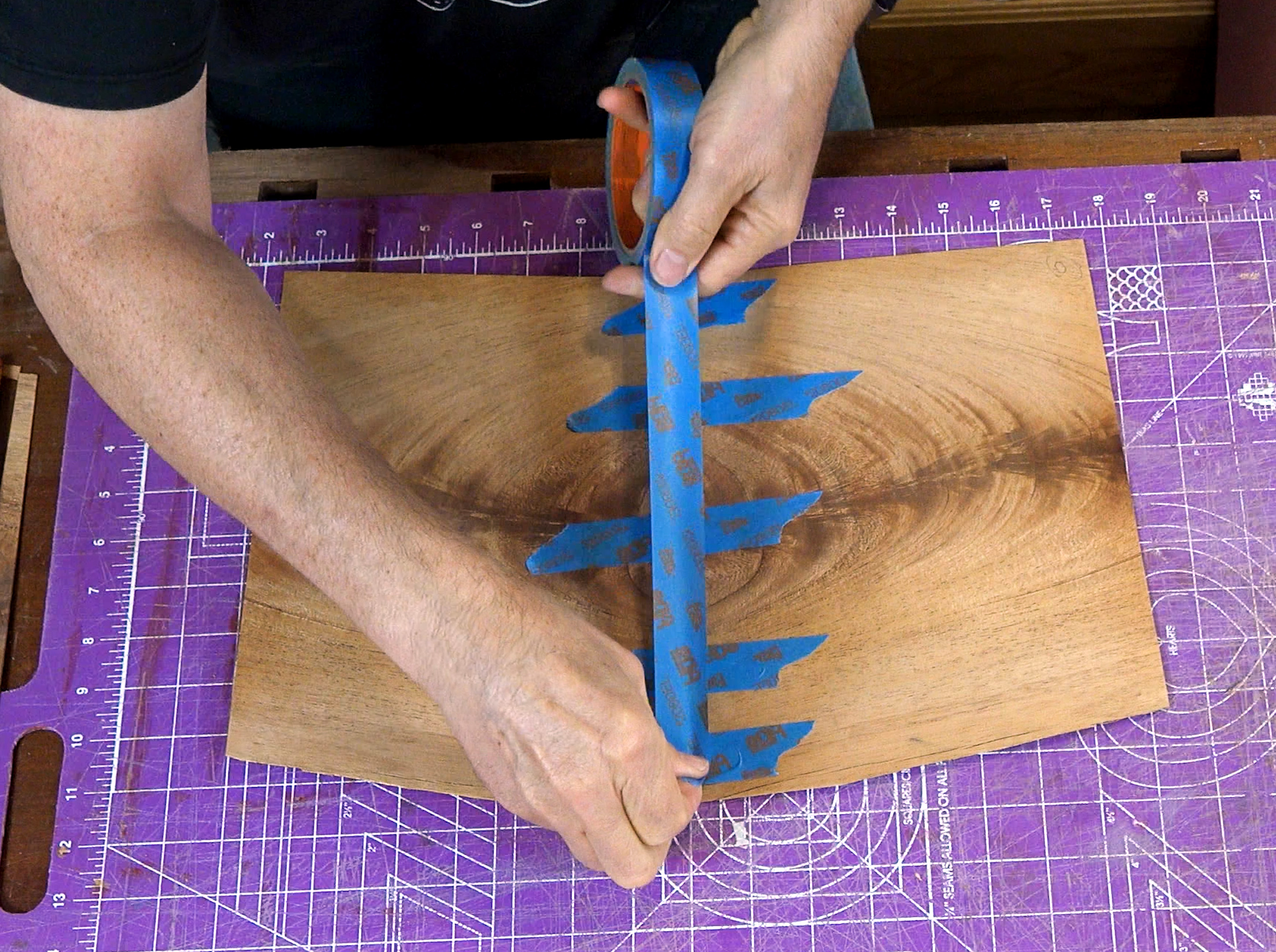 taping pieces with blue tape