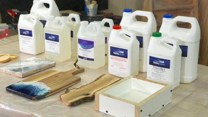 Bottles of epoxy and wood projects