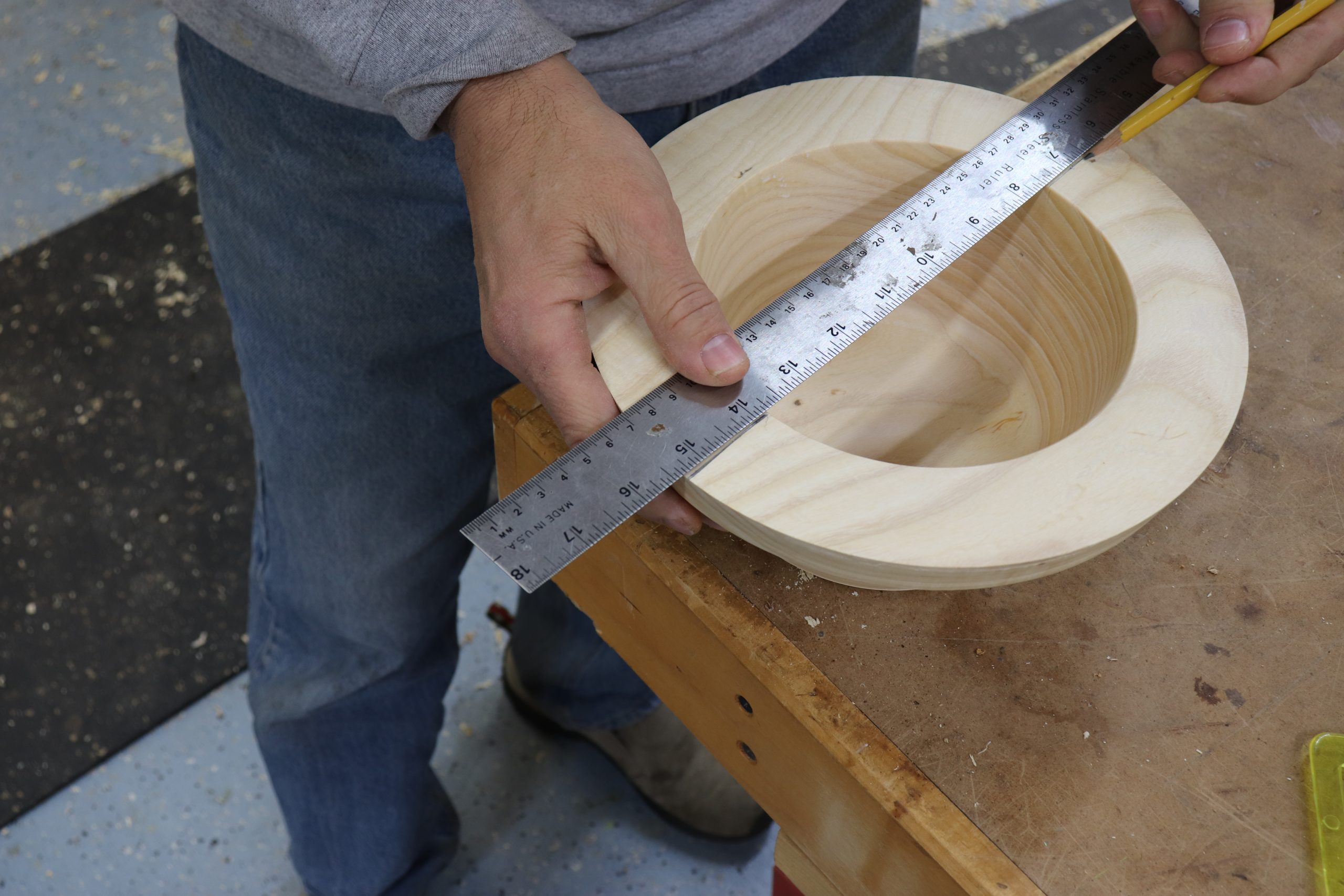 measuring the center of the bowl with a ruler