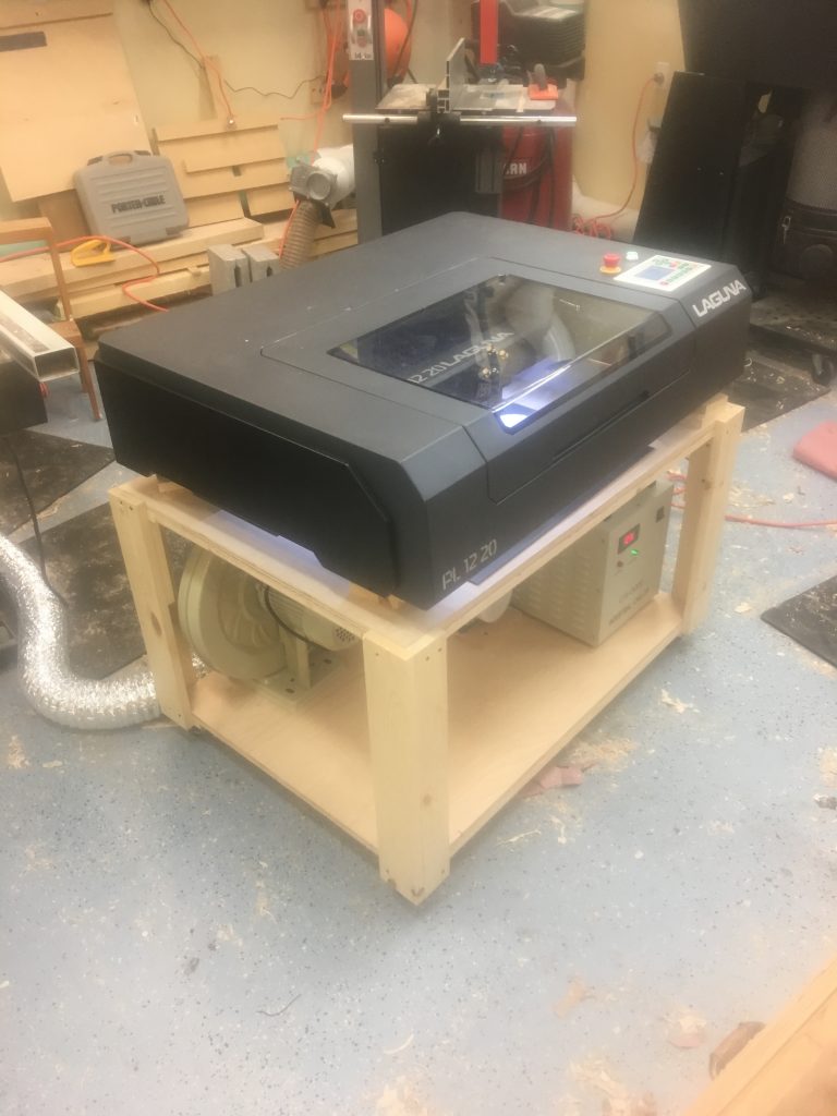 Laser engraver on a wooden stand