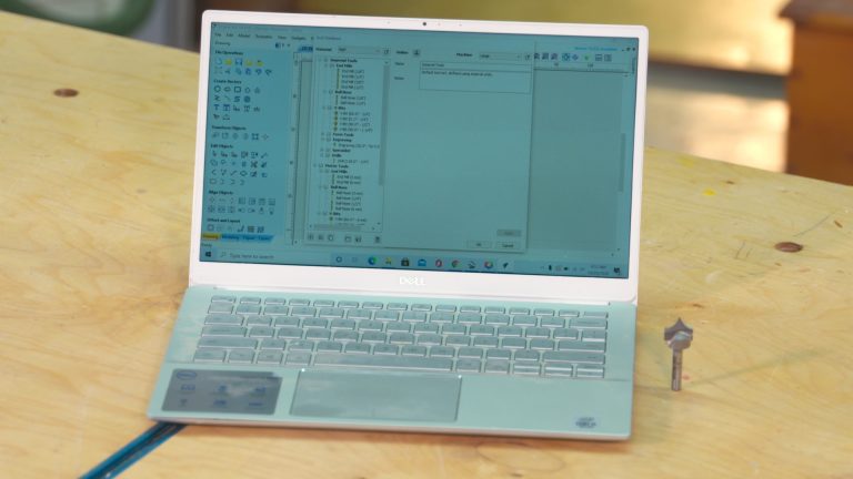 Laptop open on a work desk