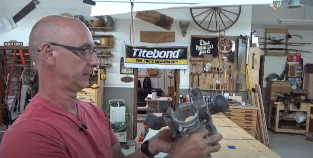 Man holding a woodworking tool