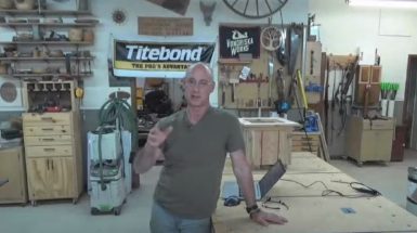Man talking in a wood work shop