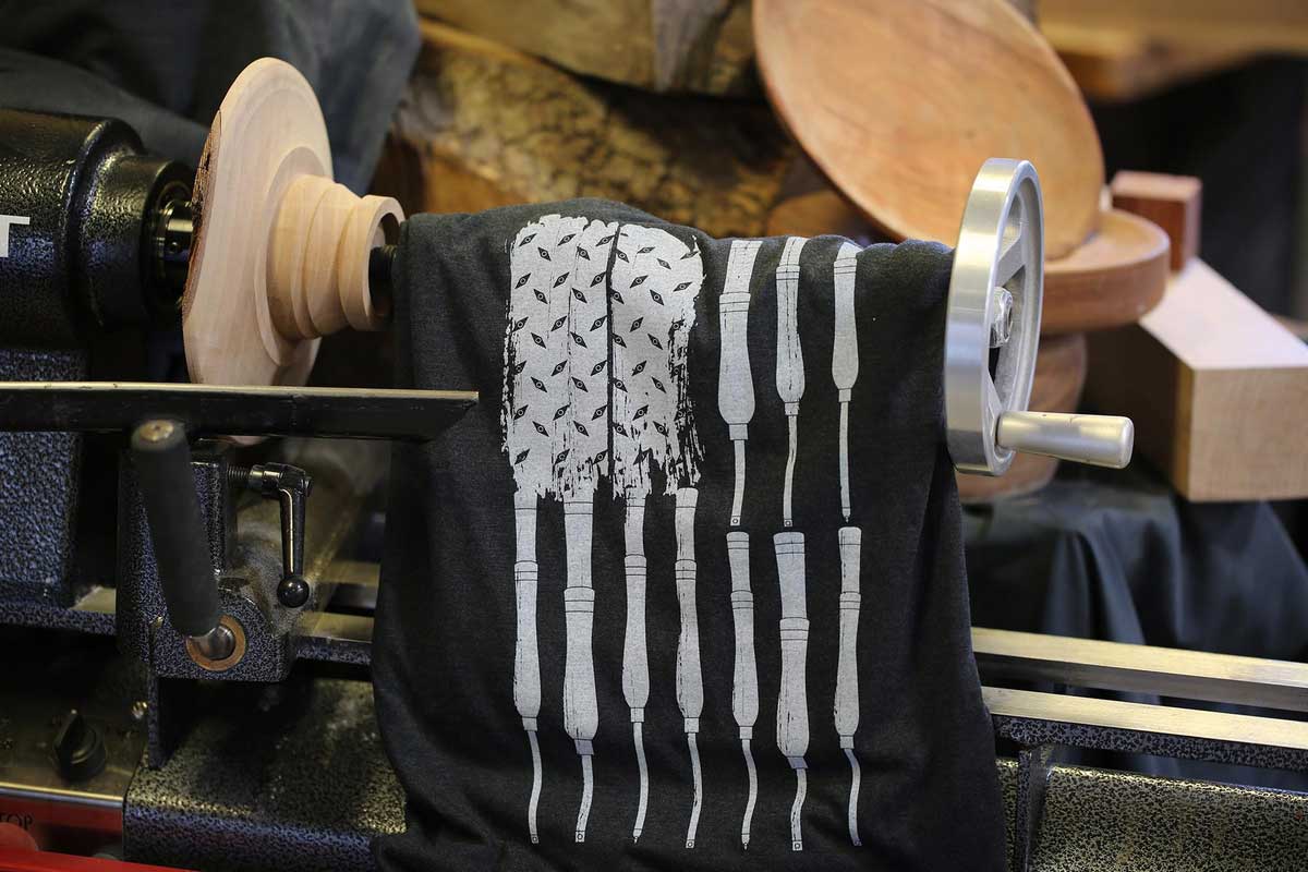 Shirt with the likeness of the American flag made from wood turning tools