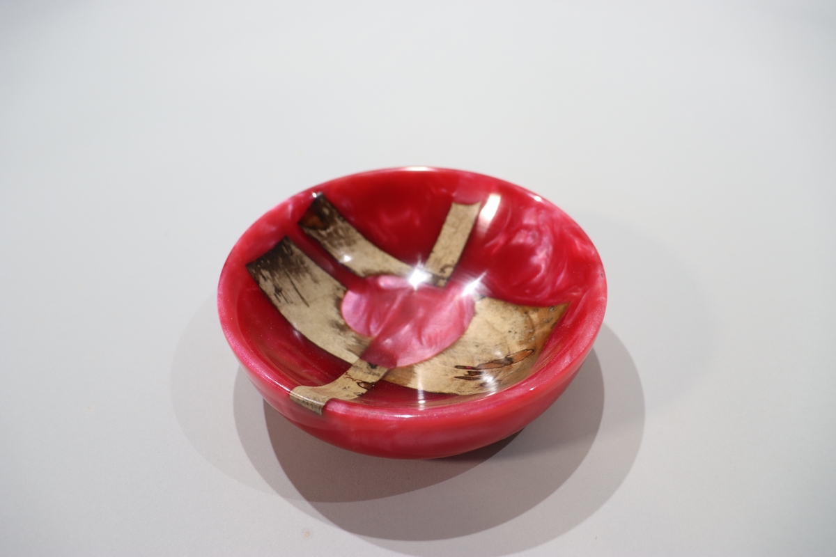 red and wood epoxy bowl